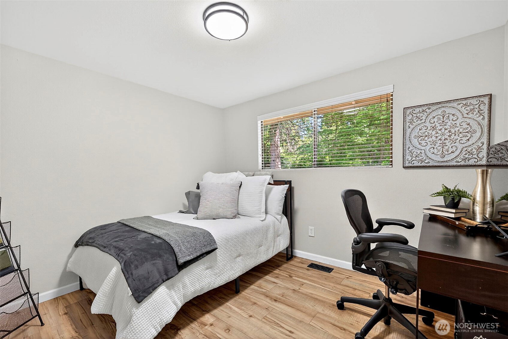 112 Lila Street Steilacoom, WA 98388 - Photo 19 of 37 a bedroom with a bed a desk and chair