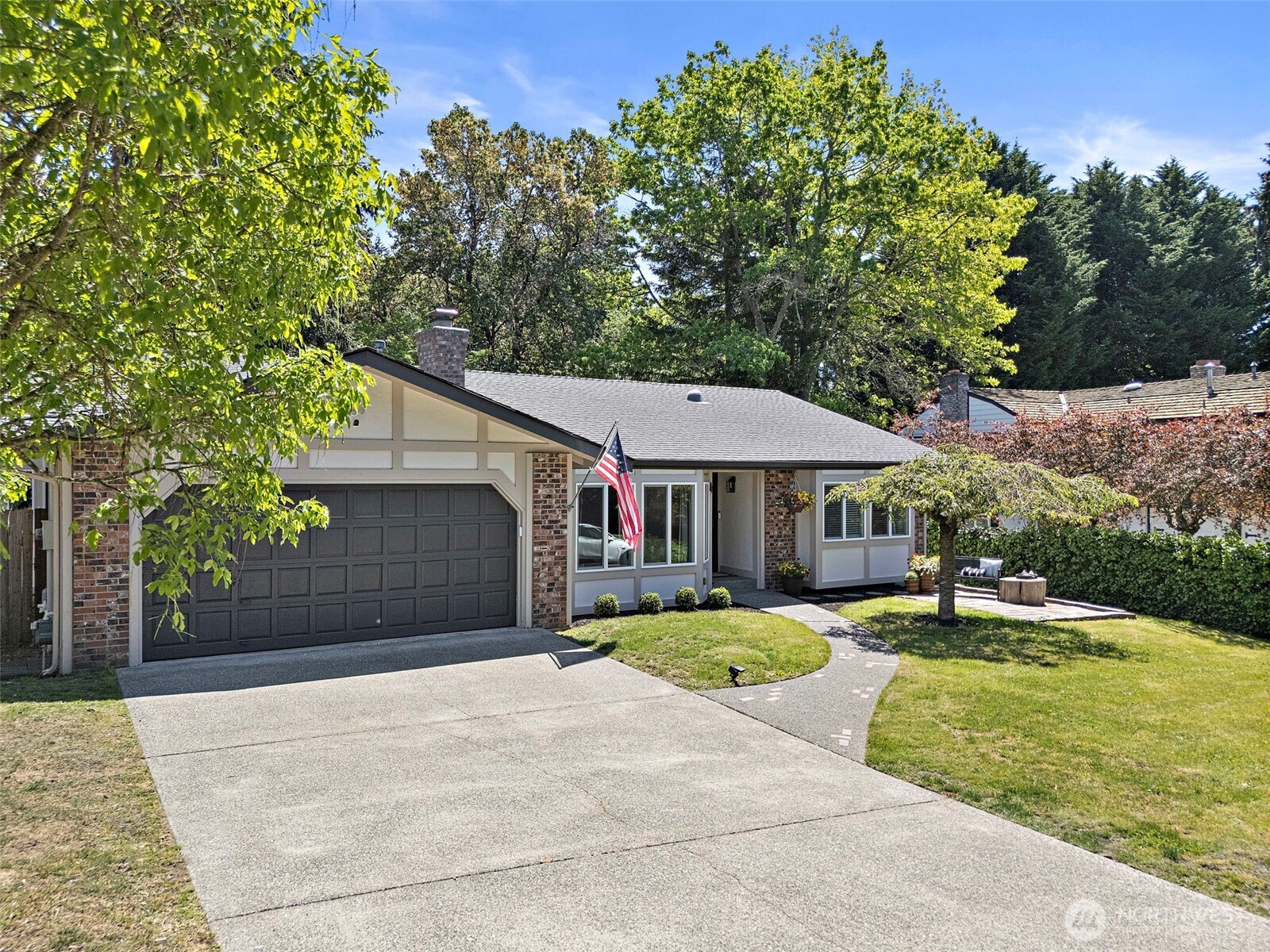 112 Lila Street Steilacoom, WA 98388 - Photo 2 of 37 a backyard of a house with yard and outdoor seating