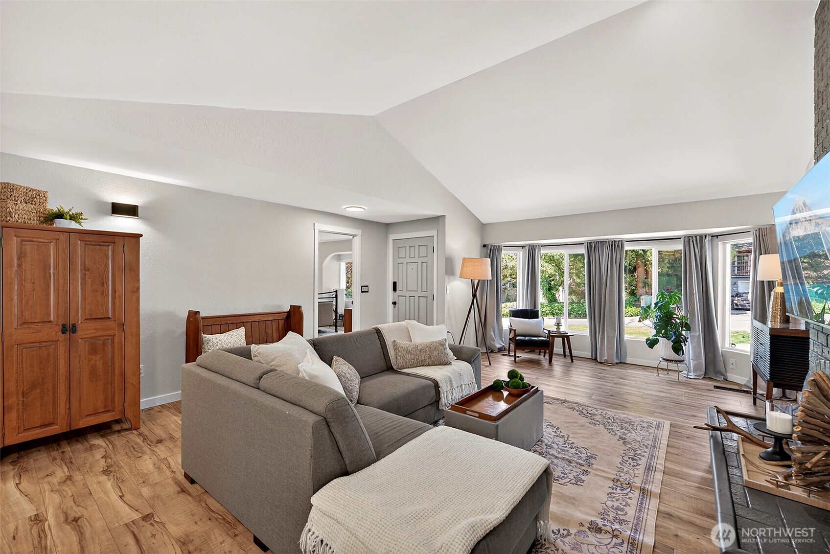 112 Lila Street Steilacoom, WA 98388 - Photo 3 of 37 a living room with furniture and large windows