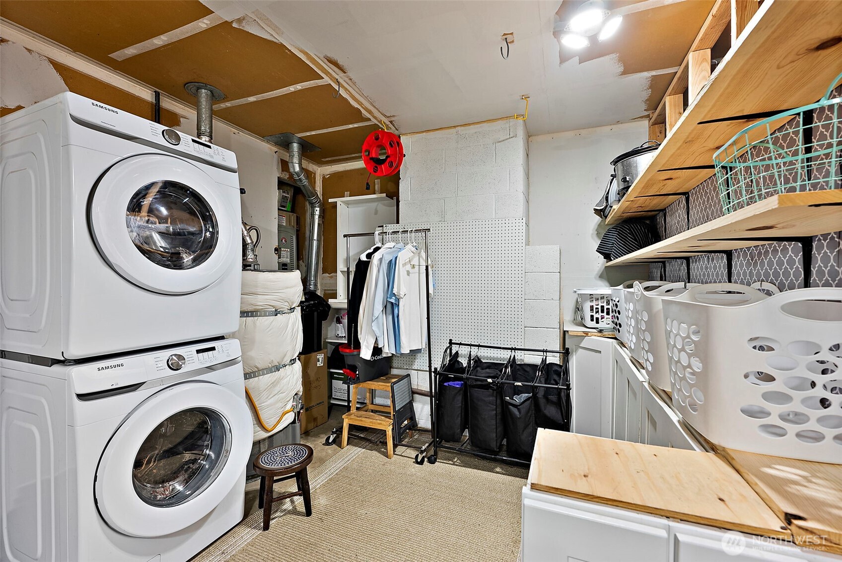 112 Lila Street Steilacoom, WA 98388 - Photo 32 of 37 a view of a storage & utility room with washer and dryer
