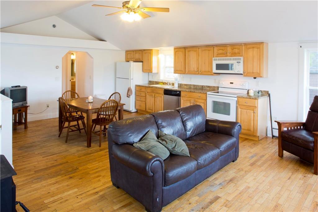 8 Gould Road Orono, ME 04473 - Photo 4 of 21 Living room and kitchen open with...