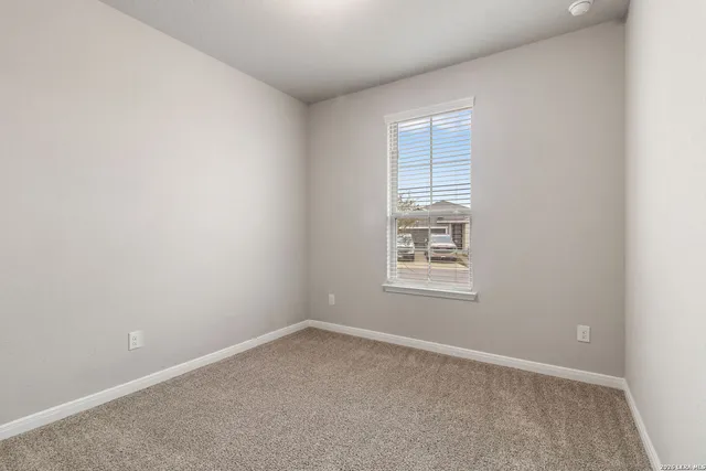 an empty room with a window