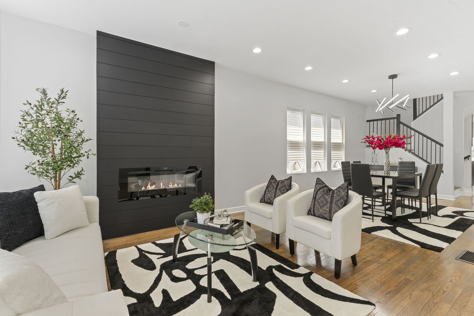 8746 South Wood Street Chicago, IL 60620 - Photo 3 of 27 a living room with furniture and a fireplace