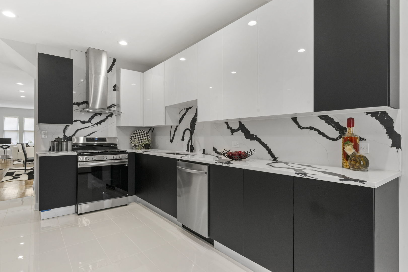 8746 South Wood Street Chicago, IL 60620 - Photo 9 of 27 a kitchen with a sink cabinets and appliances