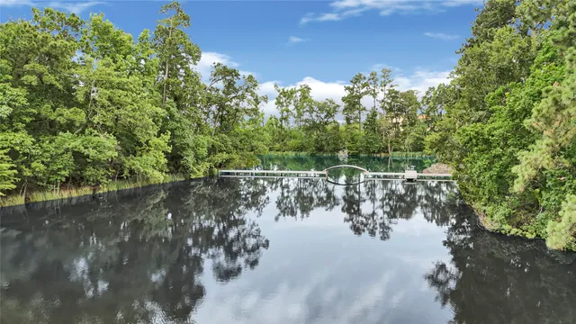 a view of water with a mountain