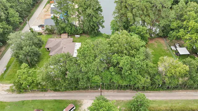 an aerial view of residential house with outdoor space