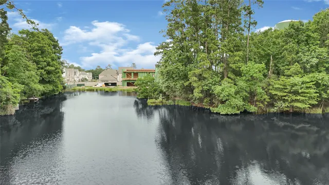 a view of lake with green space