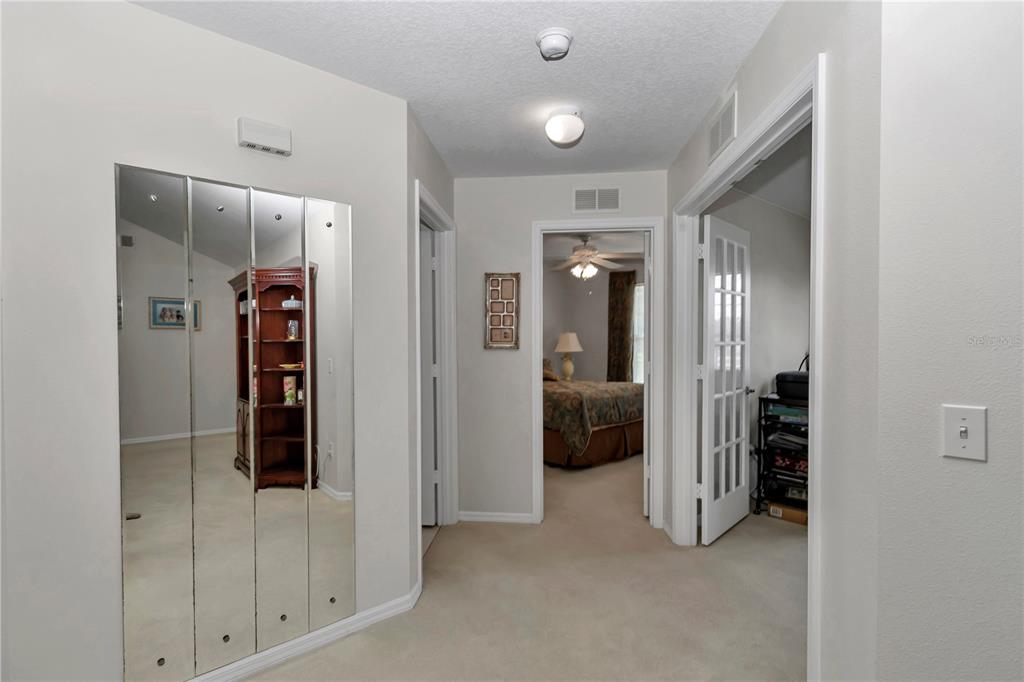 8342 Southwest 65th Avenue Ocala, FL 34476 - Photo 23 of 40 a view of a hallway with closet and bathroom
