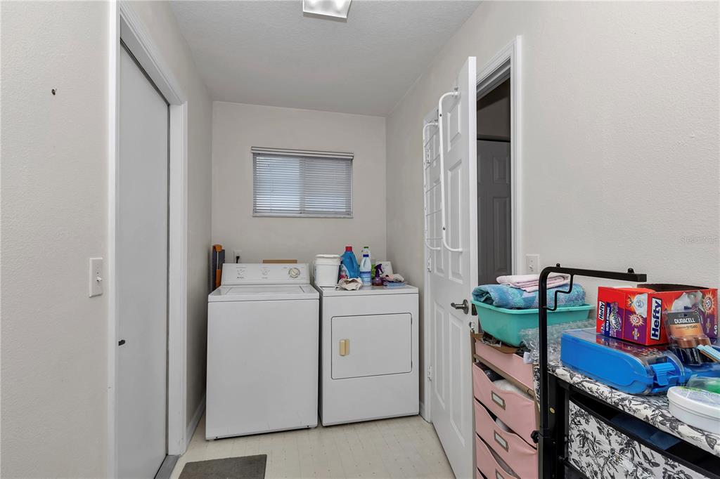 8342 Southwest 65th Avenue Ocala, FL 34476 - Photo 29 of 40 a utility room with dryer and washer