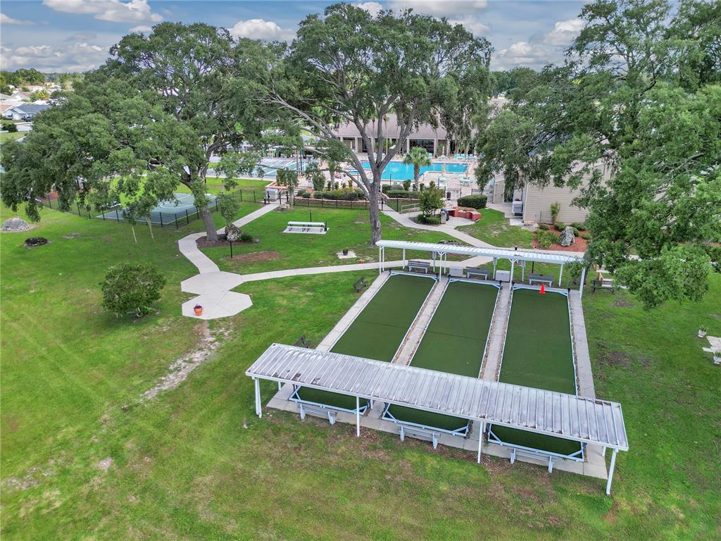 8342 Southwest 65th Avenue Ocala, FL 34476 - Photo 38 of 40 a view of a two chairs in the park