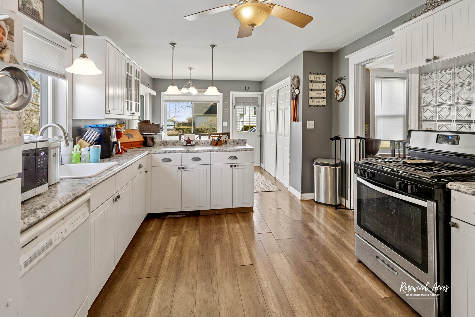 321 East Jackson Street Cullom, IL 60929 - Photo 5 of 22 a kitchen with stainless steel appliances a white stove top oven and a refrigerator
