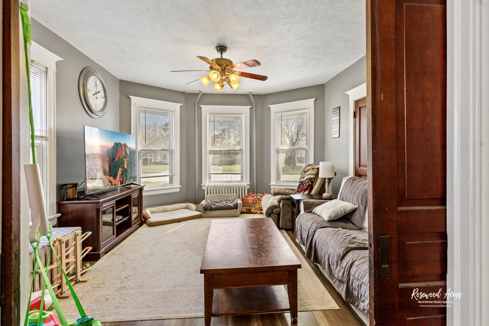 321 East Jackson Street Cullom, IL 60929 - Photo 7 of 22 a living room with furniture chandelier and a window