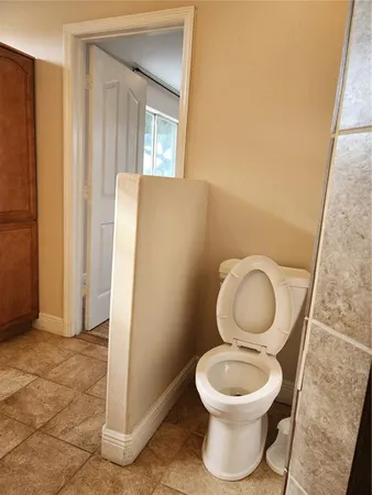 a view of a street with a bench