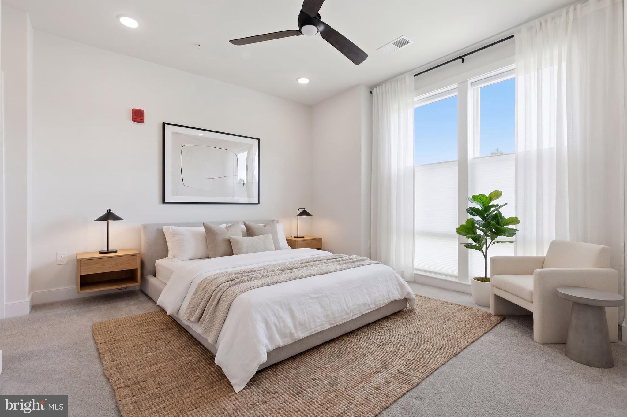 11200 Reston Station Boulevard, Unit 205 Reston, VA 20190 - Photo 17 of 39 Main Bedroom - Virtual Stage
