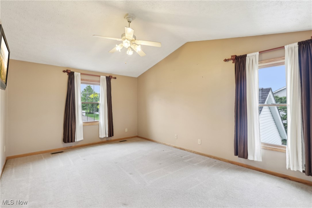 108 Joshua Drive Rittman, OH 44270 - Photo 15 of 44 Primary bedroom with Vaulted Ceilings