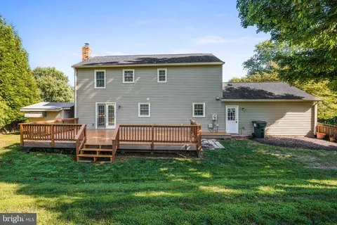 a view of front door with wooden floor