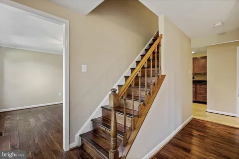 a view of entryway with wooden floor