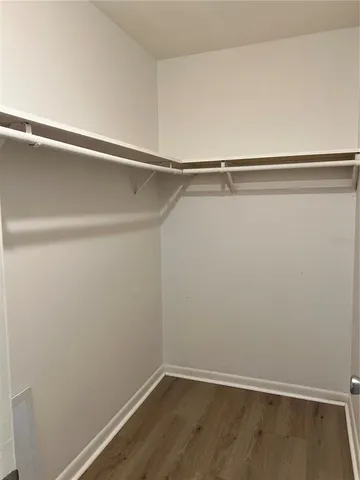 a view of an empty walk in closet