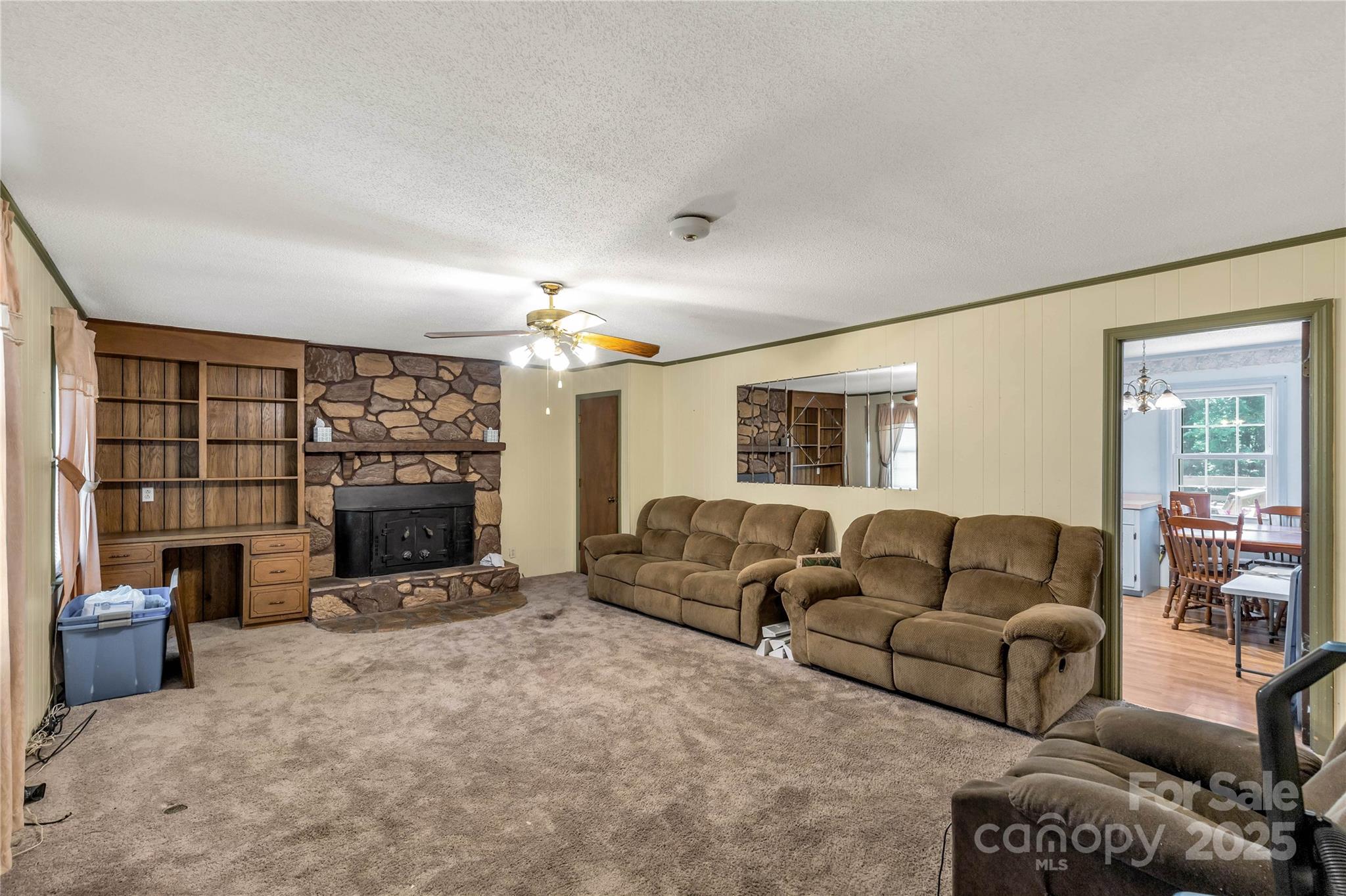 4330 Rowell Road Lancaster, SC 29720 - Photo 6 of 27 a living room with furniture and a fireplace