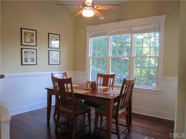 5 Chasewood Court Durham, NC 27703 - Photo 11 of 25 a view of a dining room with furniture window and wooden floor