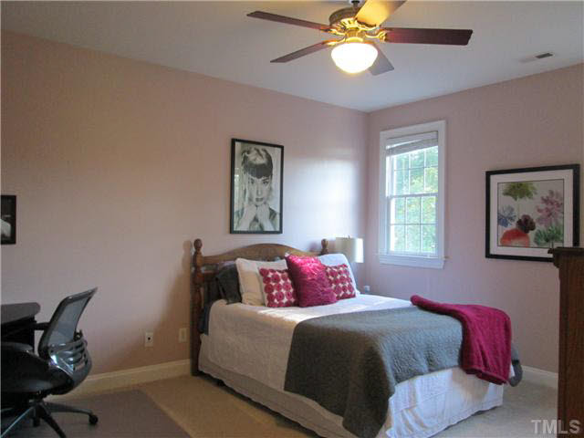 5 Chasewood Court Durham, NC 27703 - Photo 15 of 25 a bedroom with a bed and a window