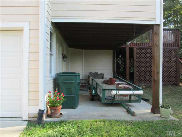 5 Chasewood Court Durham, NC 27703 - Photo 24 of 25 a backyard of a house with seating space