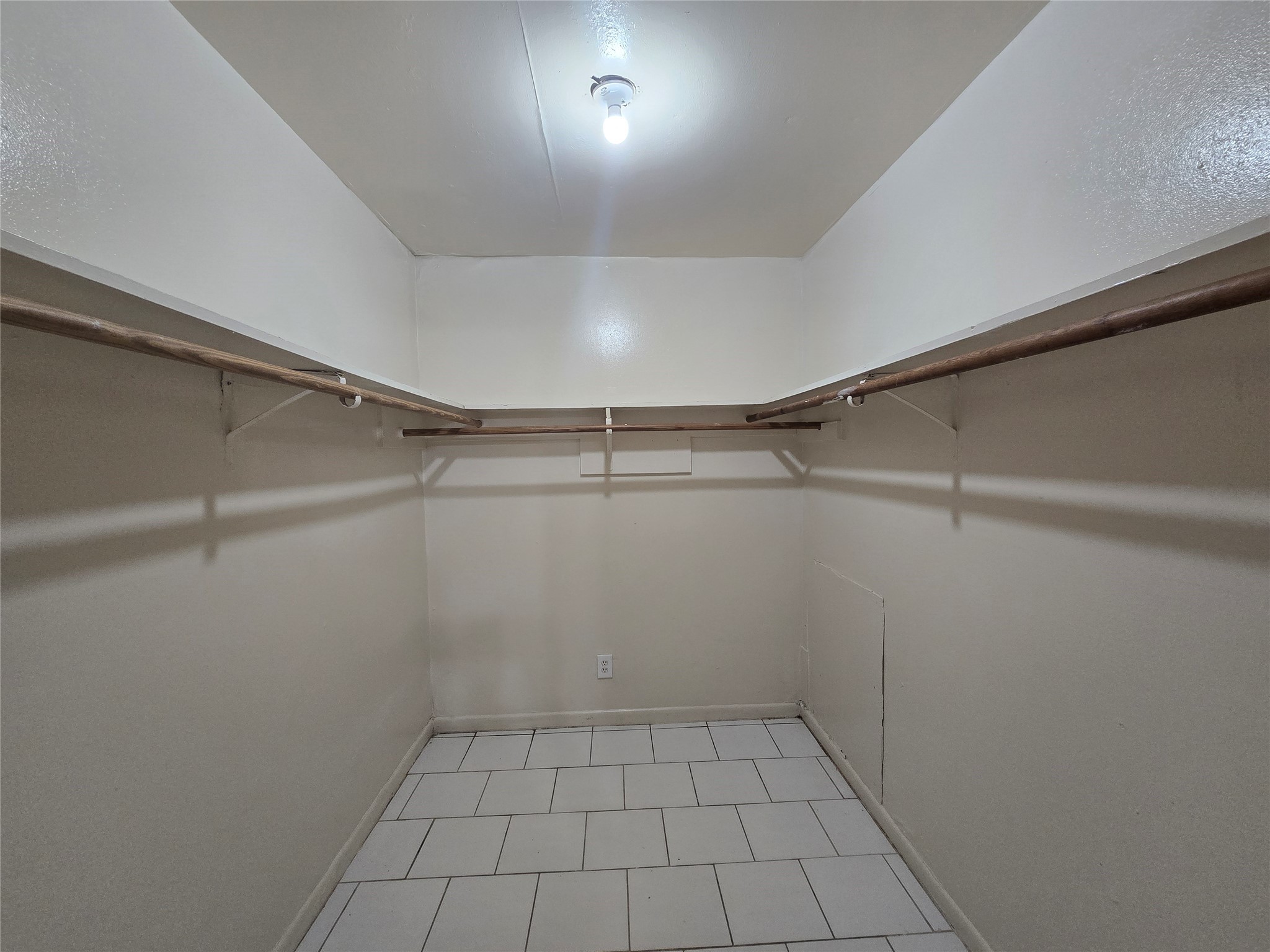 3714 Ave South, Unit 7 Galveston, TX 77550 - Photo 3 of 8 a view of a room with racks on the wall