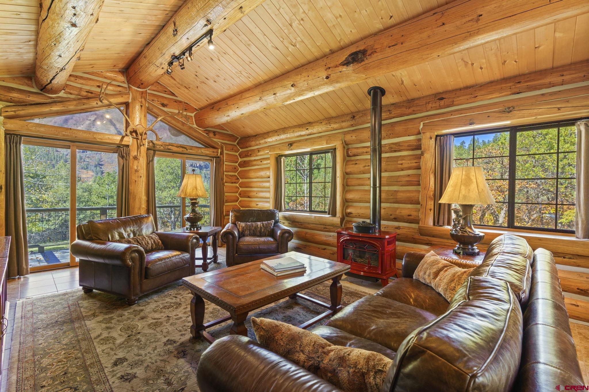 114 Rimrock Drive Durango, CO 81301 - Photo 16 of 42 a living room with furniture a large window