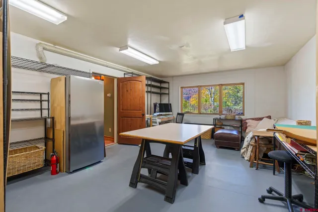 a room with furniture and a window