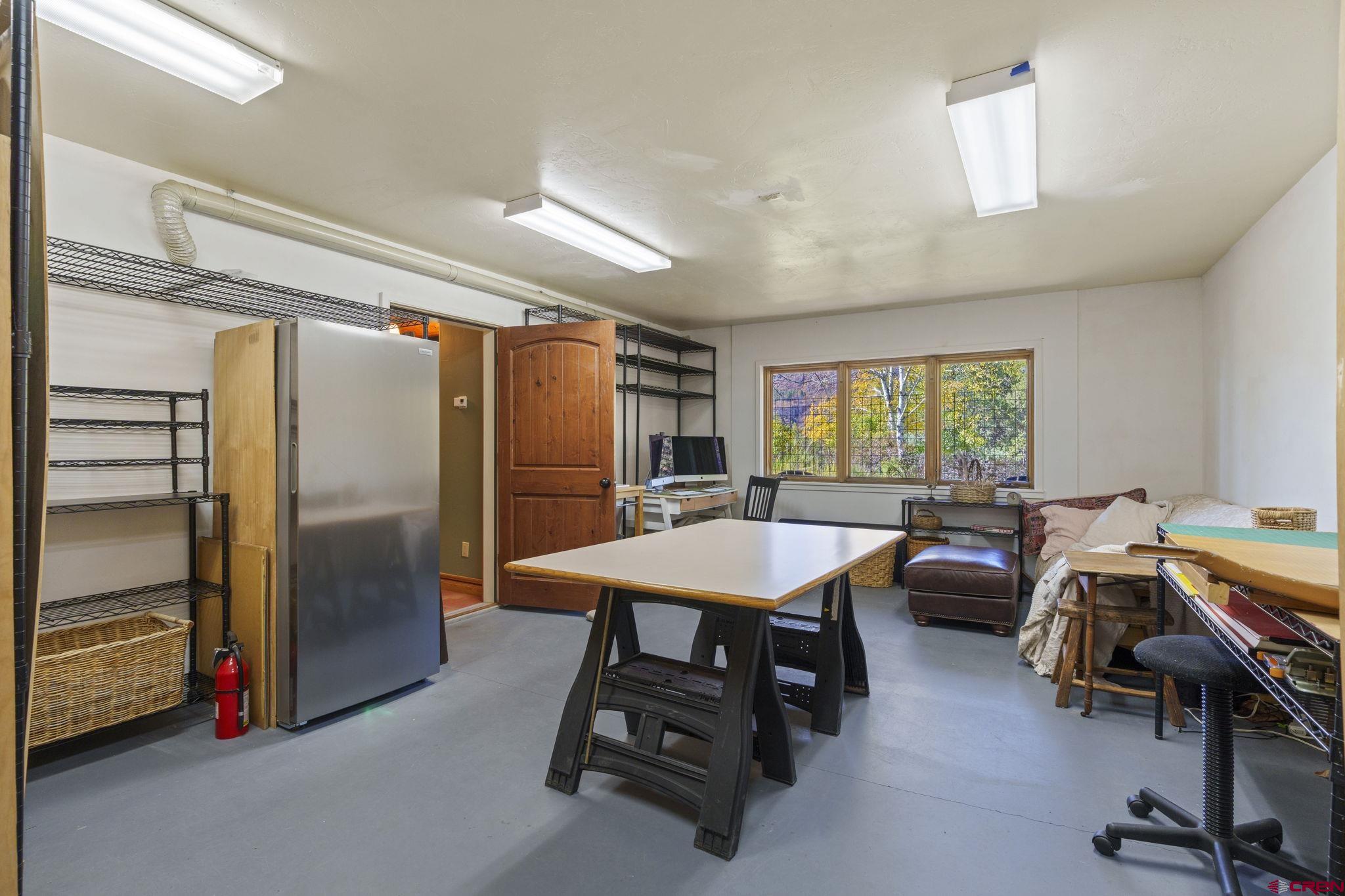 114 Rimrock Drive Durango, CO 81301 - Photo 24 of 42 a room with furniture and a window
