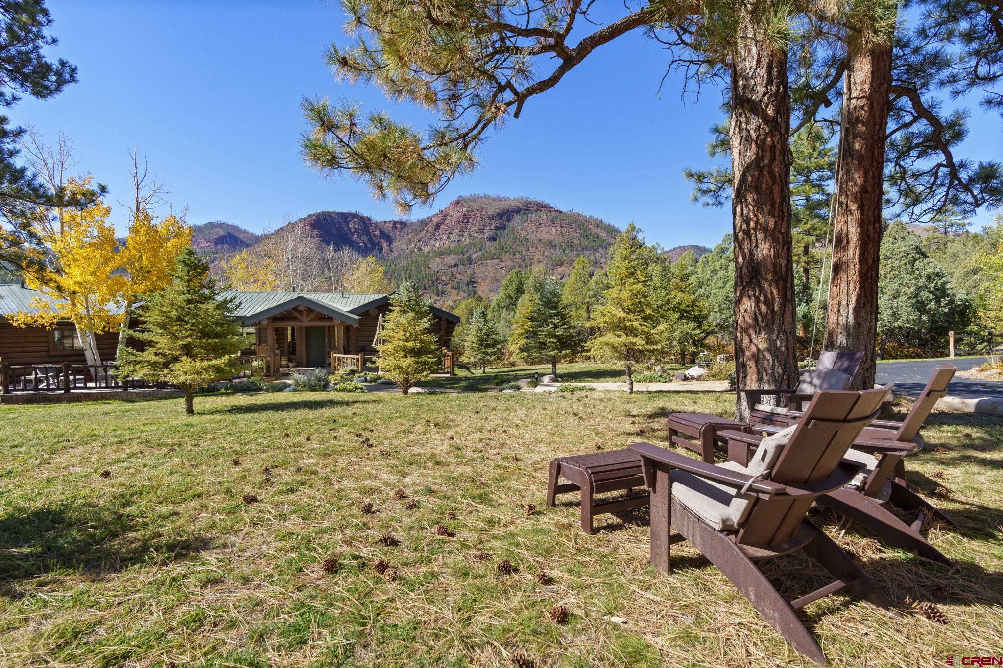 114 Rimrock Drive Durango, CO 81301 - Photo 26 of 42 a view of a house with a yard