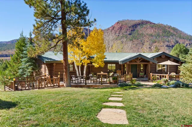 a front view of a building with garden