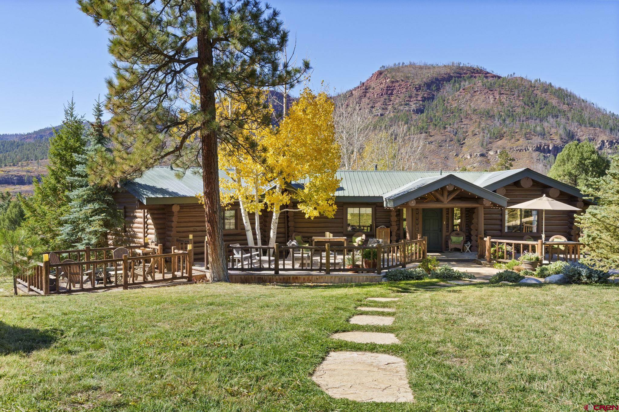 114 Rimrock Drive Durango, CO 81301 - Photo 28 of 42 a front view of a building with garden