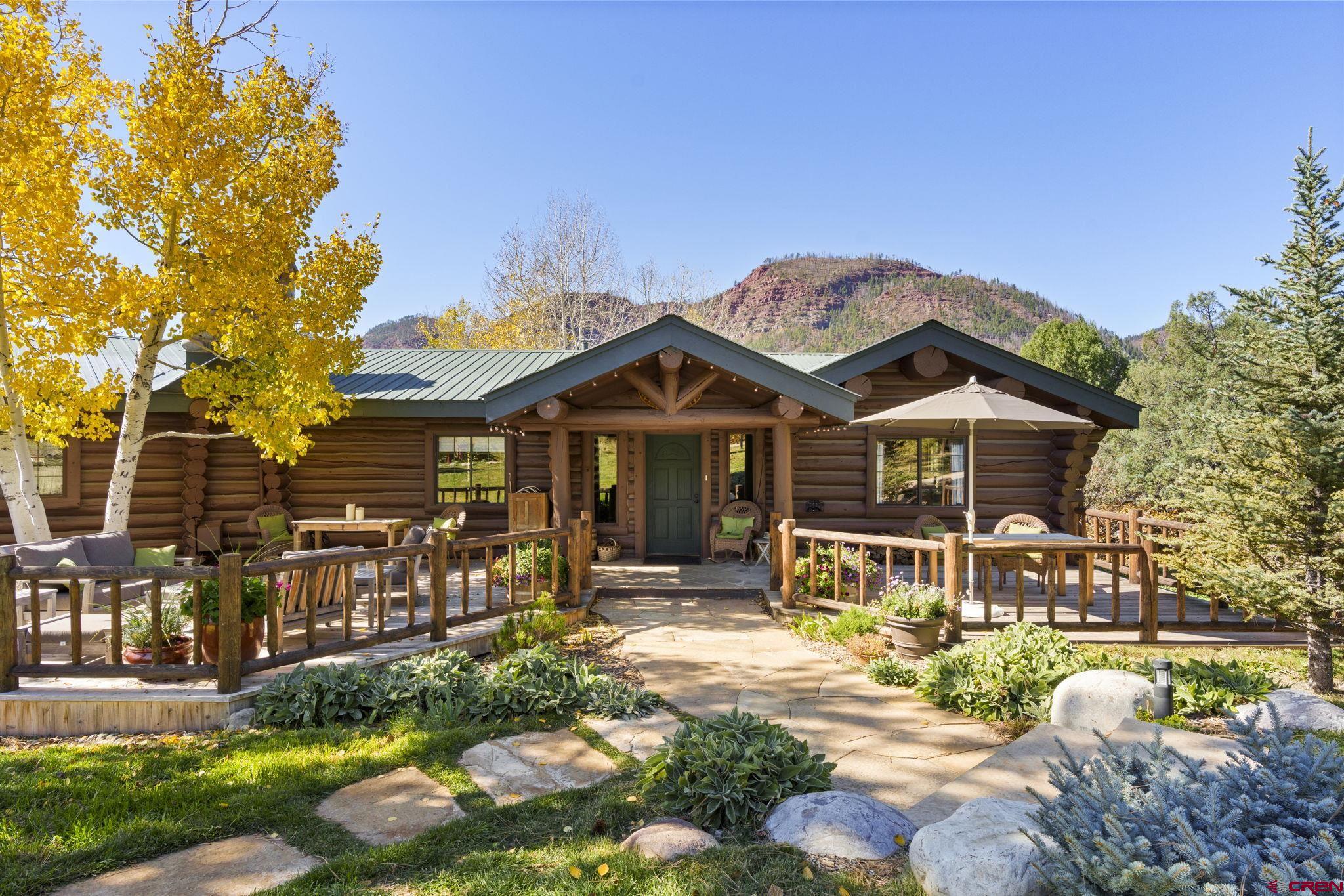 114 Rimrock Drive Durango, CO 81301 - Photo 29 of 42 a front view of a house with garden