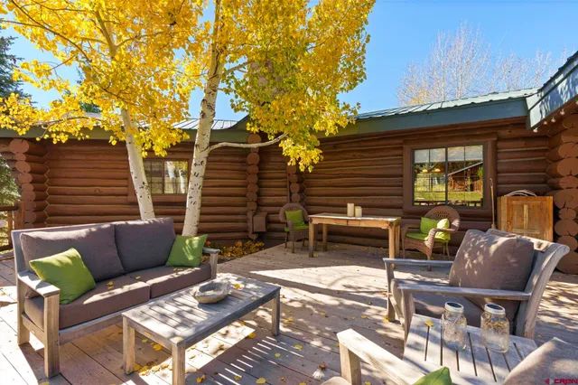 a backyard of a house with seating space
