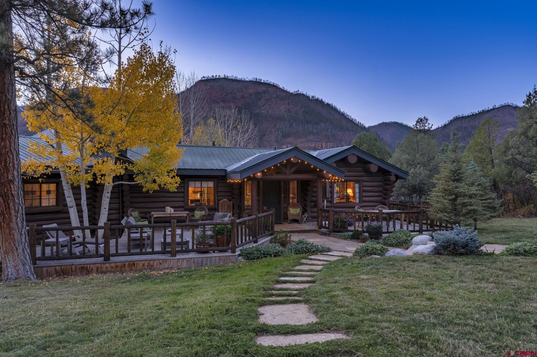 114 Rimrock Drive Durango, CO 81301 - Photo 38 of 42 a view of a house with a yard