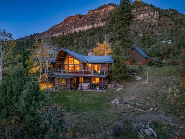 view of living room with furniture and white walls
