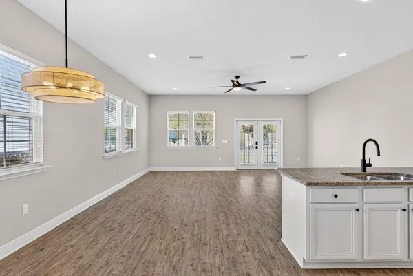 a view of a kitchen with marble kitchen and sink