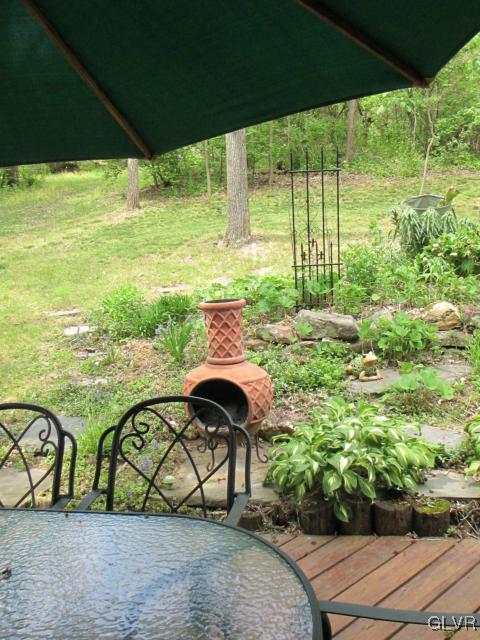 317 Filetown Road Nazareth, PA 18064 - Photo 35 of 37 a view of a garden with a bench in a patio