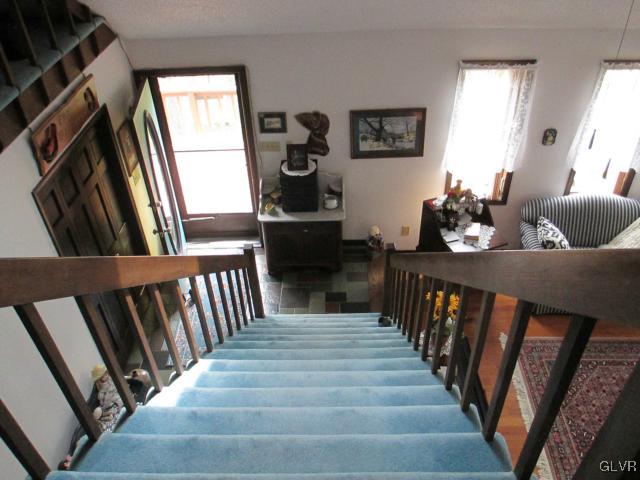 317 Filetown Road Nazareth, PA 18064 - Photo 10 of 37 a view of a hallway to dining room and wooden floor