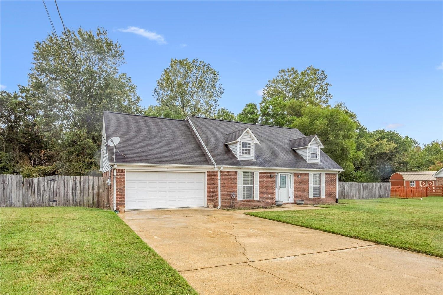 46 Countryside Circle Brighton, TN 38011 - Photo 19 of 23 front view of a house with a yard