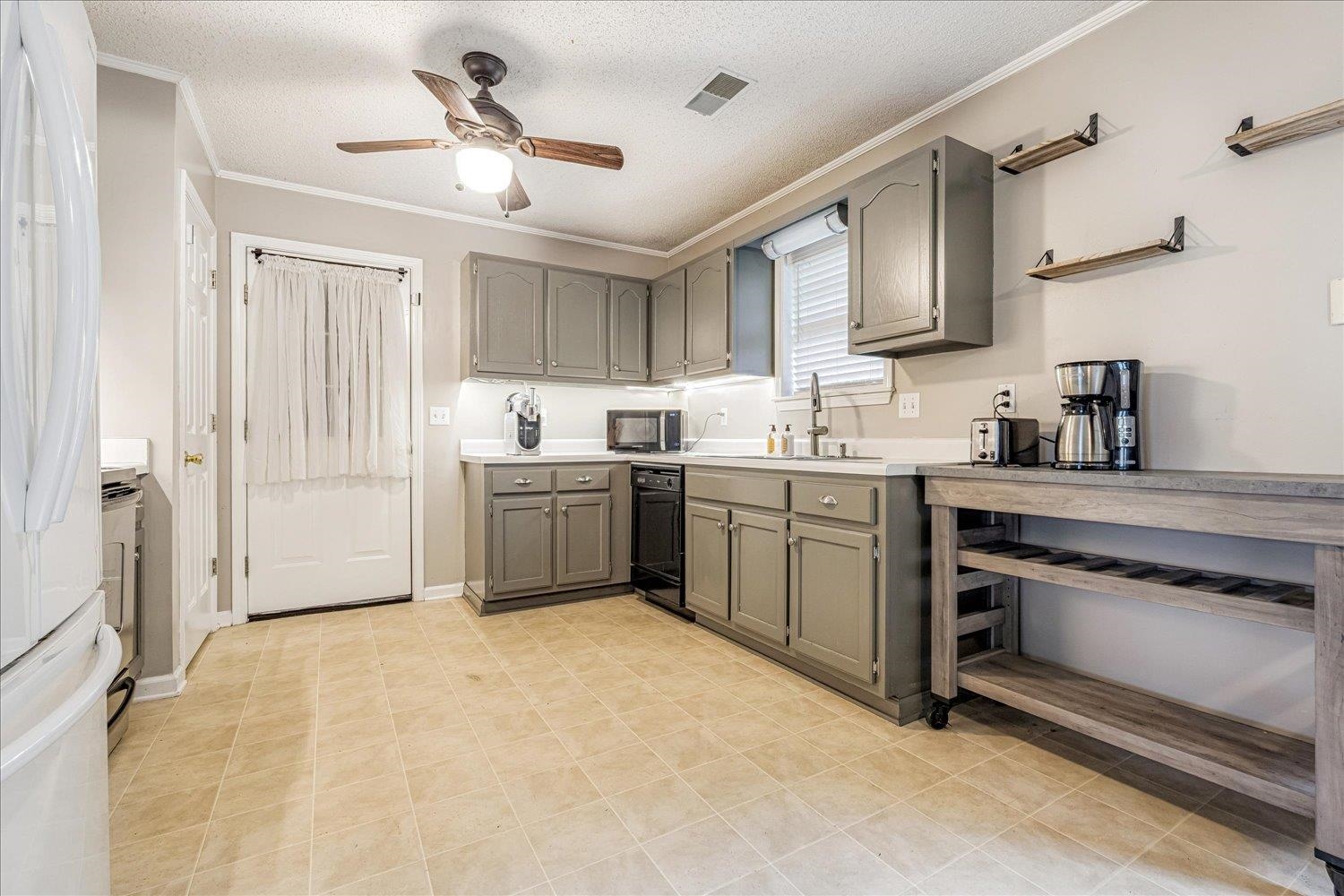 46 Countryside Circle Brighton, TN 38011 - Photo 6 of 23 a kitchen with a sink stove and cabinets