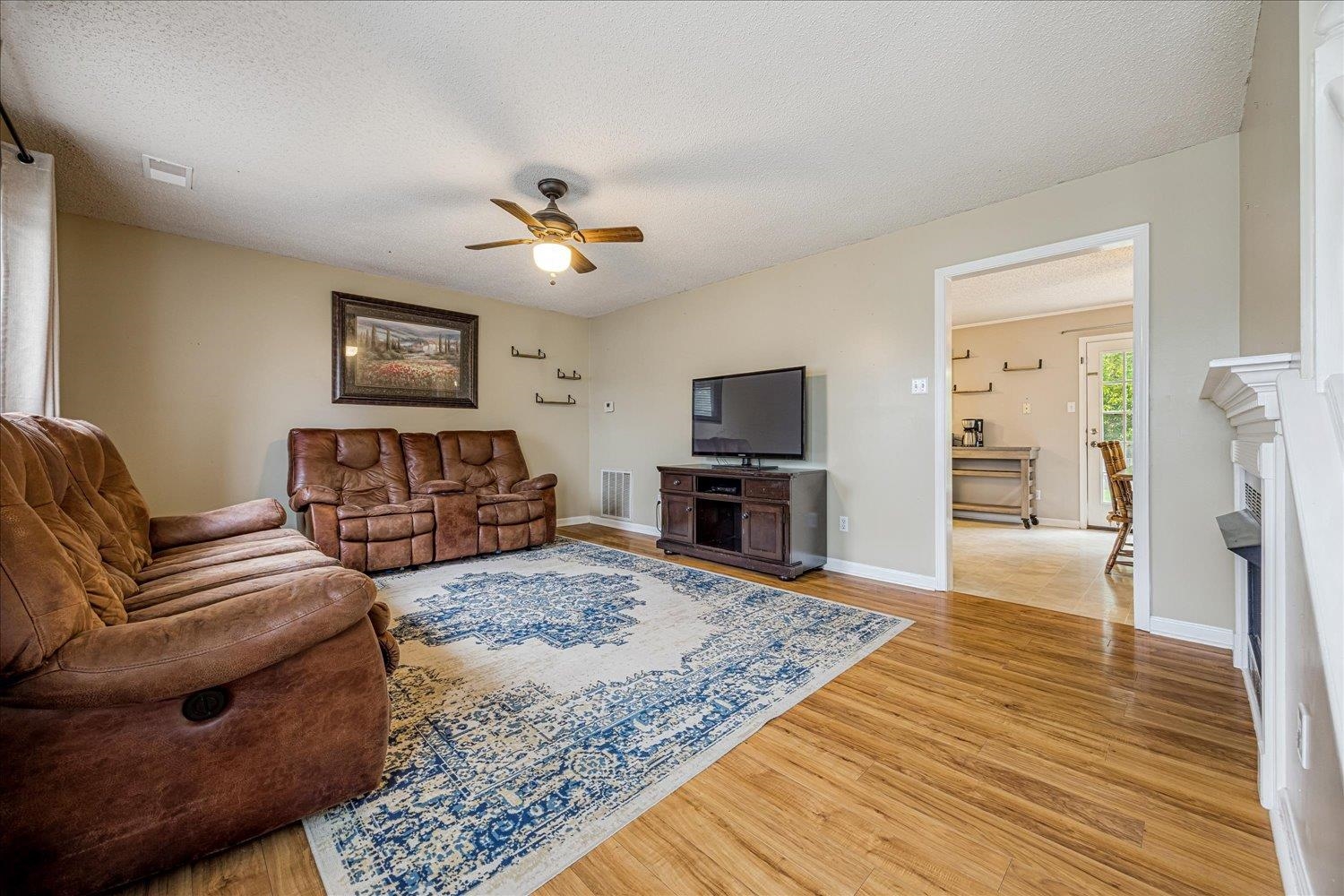 46 Countryside Circle Brighton, TN 38011 - Photo 7 of 23 a living room with furniture and a flat screen tv