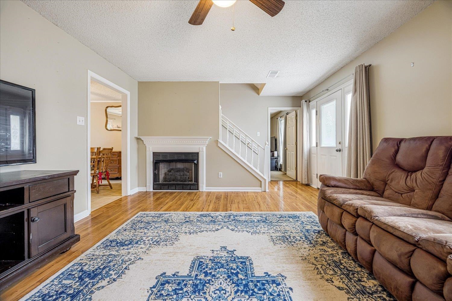 46 Countryside Circle Brighton, TN 38011 - Photo 8 of 23 a living room with furniture and a fireplace