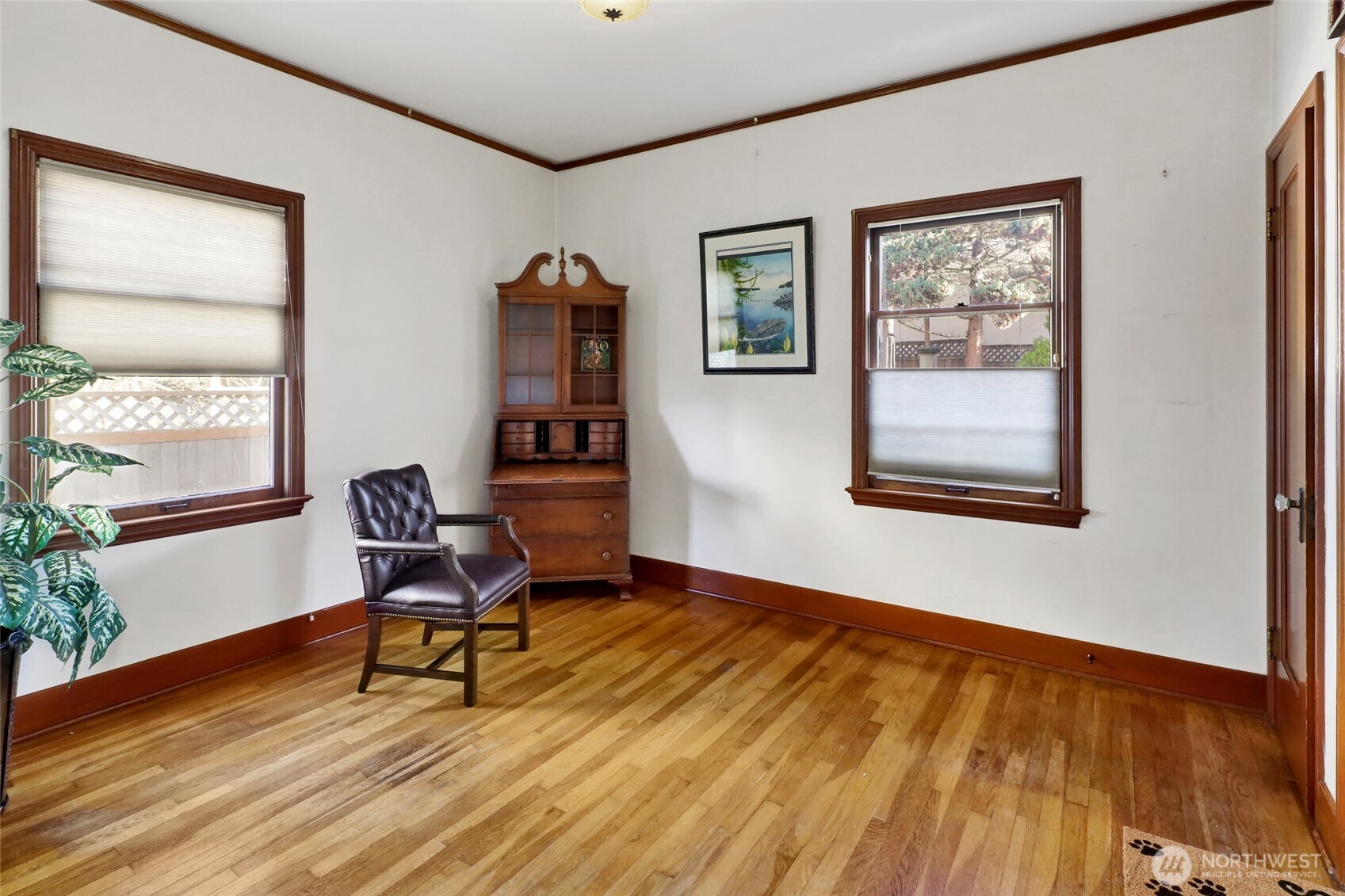 1211 14th Street Bellingham, WA 98225 - Photo 13 of 38 a workspace with wooden floor and a window