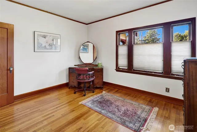 workspace with wooden floor and windows