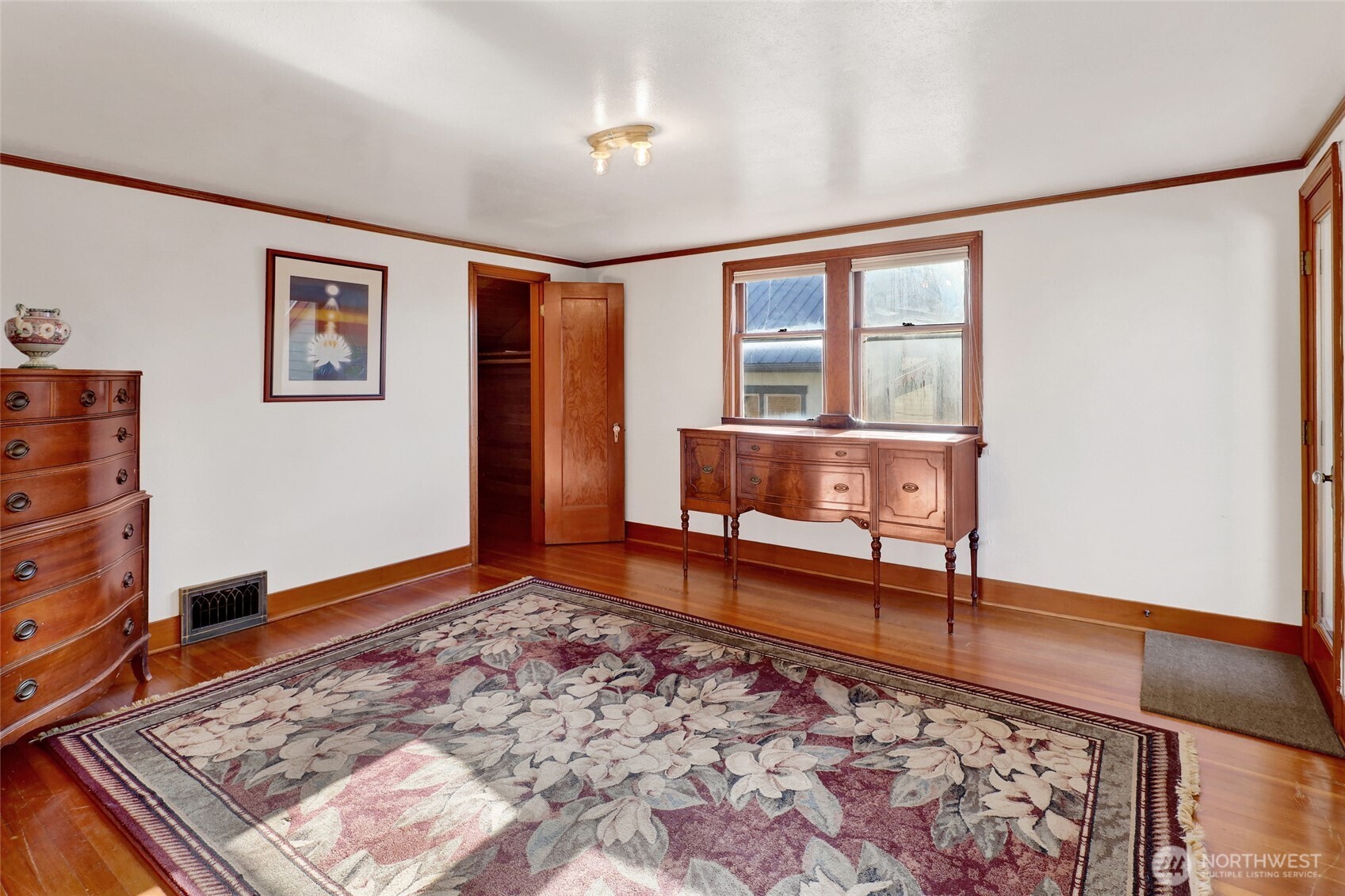 1211 14th Street Bellingham, WA 98225 - Photo 25 of 38 a living room with a couch and a rug