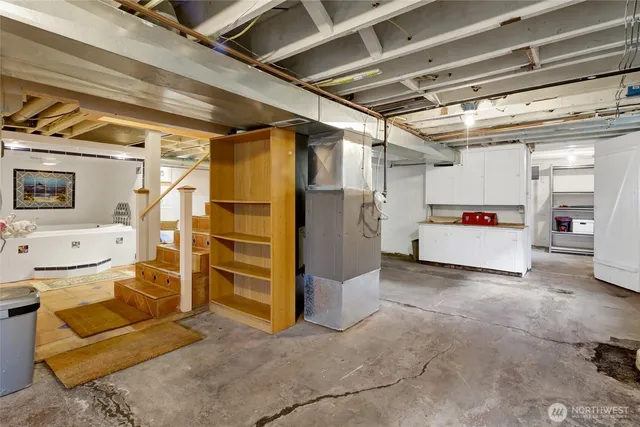 swimming pool view with plants and outdoor seating