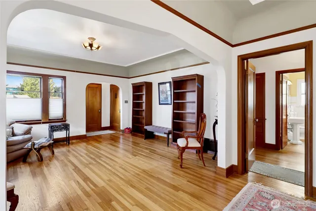 a view of livingroom with furniture and floor to ceiling window