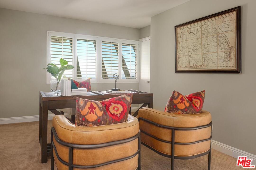 11284 Chalon Road Los Angeles, CA 90049 - Photo 12 of 14 a living room with furniture and a large window